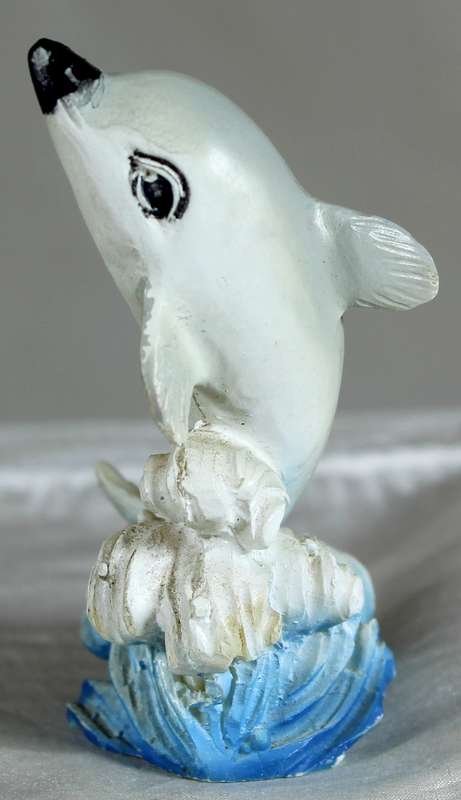 Dolphin playing in the waves