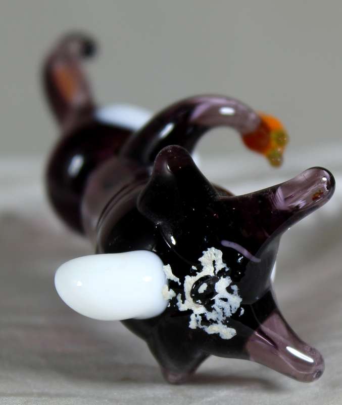 Glass rabbit holding a carrot