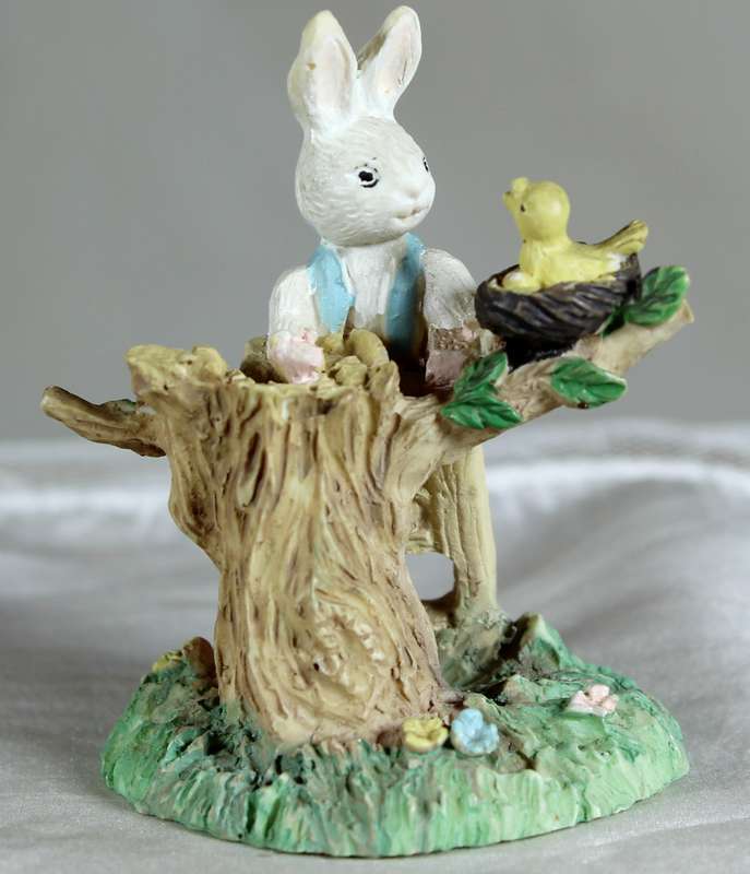 Rabbit with bird in a nest