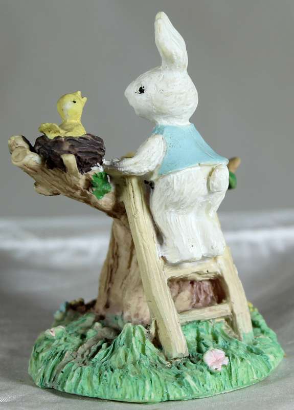 Rabbit with bird in a nest