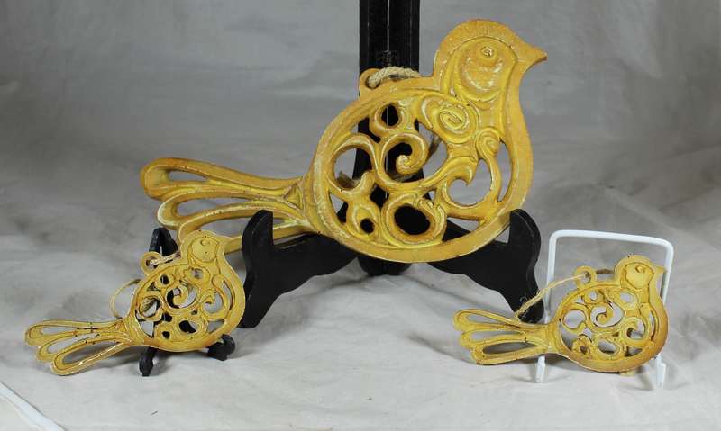 Trio of bird wall hangings