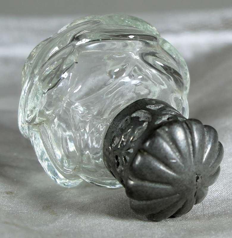 Miniature perfume bottle with metal top