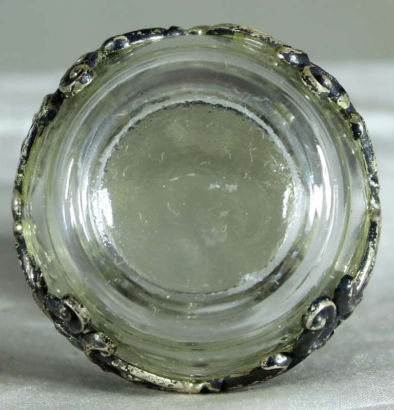 Miniature perfume bottle with metal embellishment