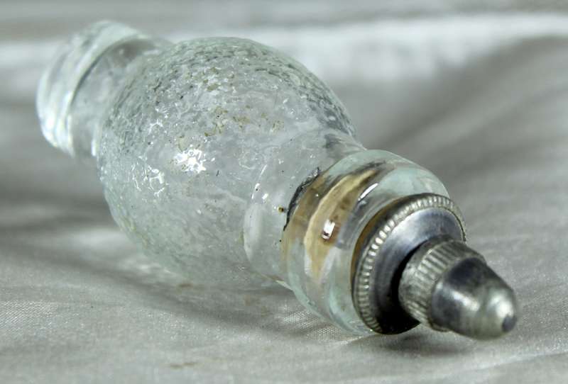 Miniature perfume bottle with metal top