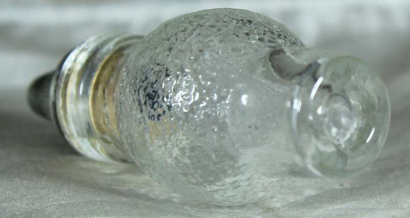 Miniature perfume bottle with metal top