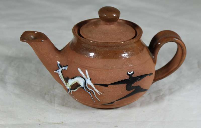 Small pottery kettle with painted figures