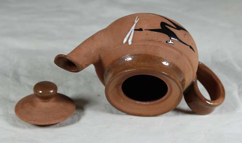 Small pottery kettle with painted figures