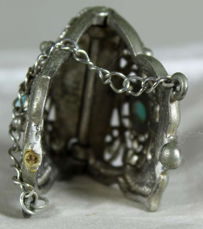 Engraved metal locket with semi-precious stones