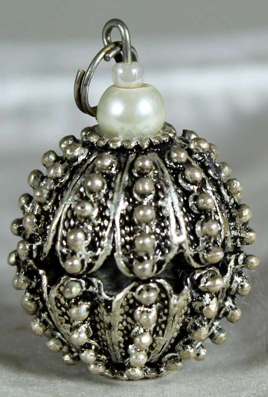 Hand made metal pendant