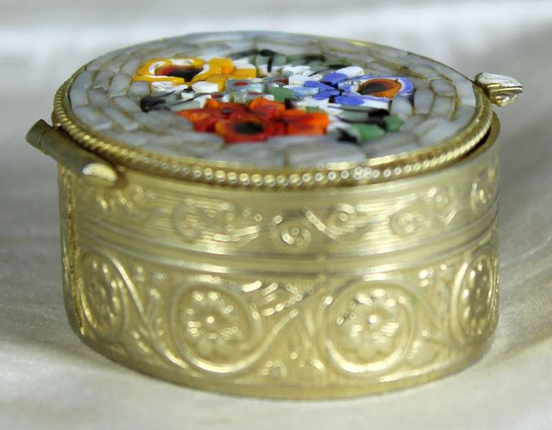 Pill box with enamel embellishment