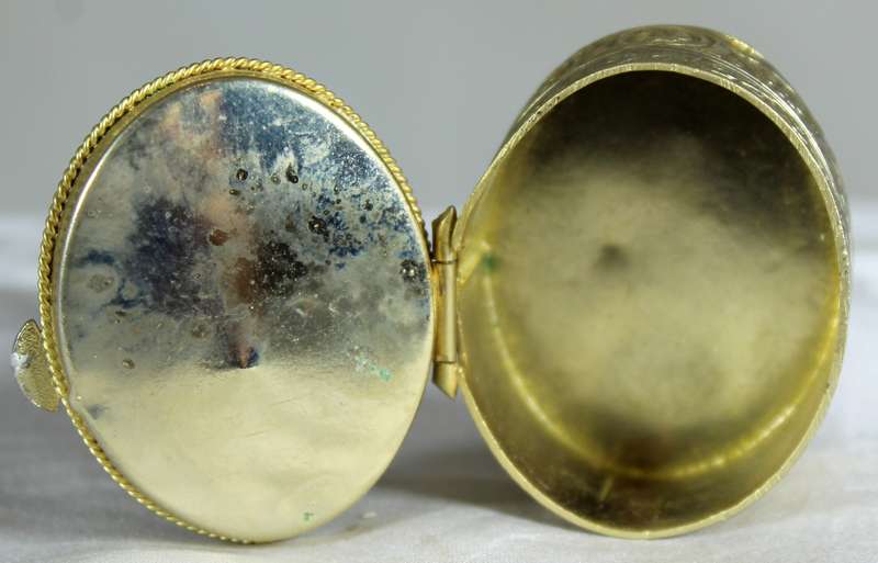 Pill box with enamel embellishment