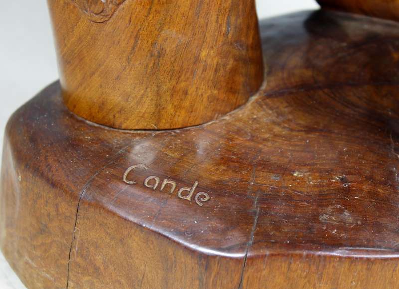 Cande - carved man playing the drums