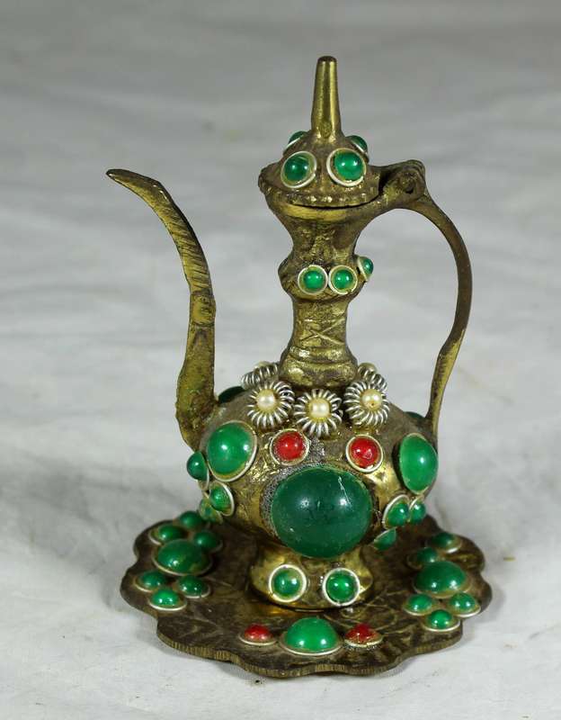Small brass Arabic / Moroccan teapot on a tray