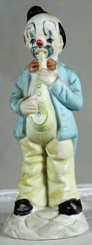 Clown playing a saxophone