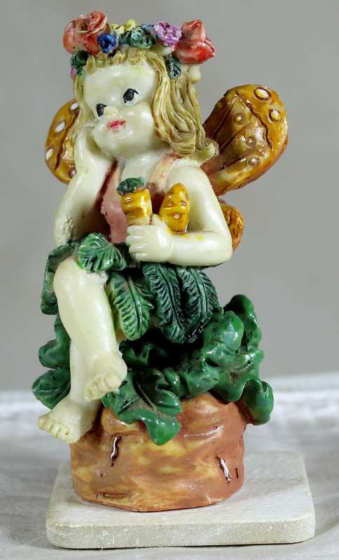Seated fairy in thought