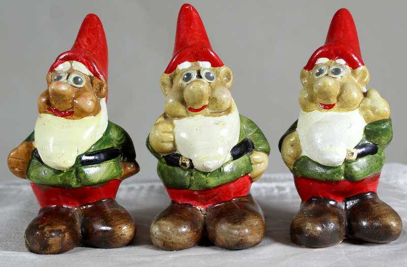 Trio of small garden gnomes