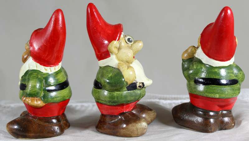 Trio of small garden gnomes