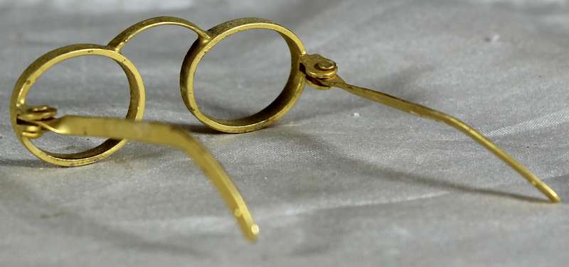 Miniature brass glasses