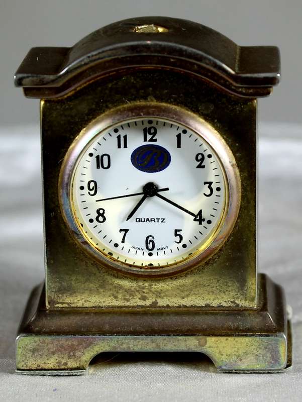 Miniature brass cabinet clock