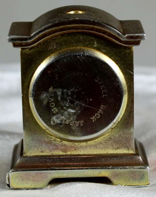 Miniature brass cabinet clock