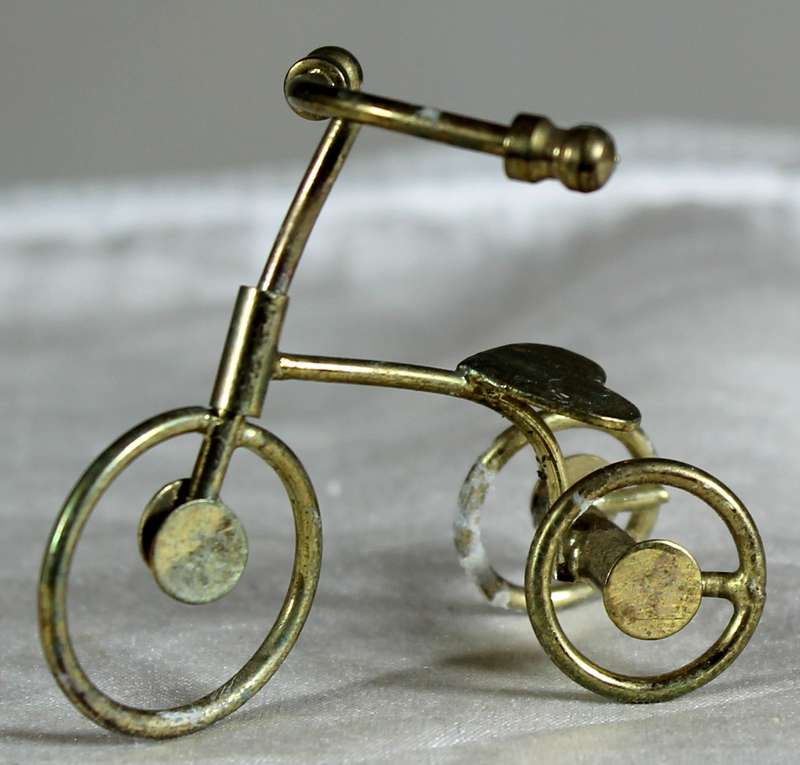 Miniature brass tricycle