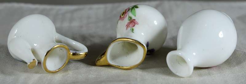 Miniature trio of jugs & posy vase