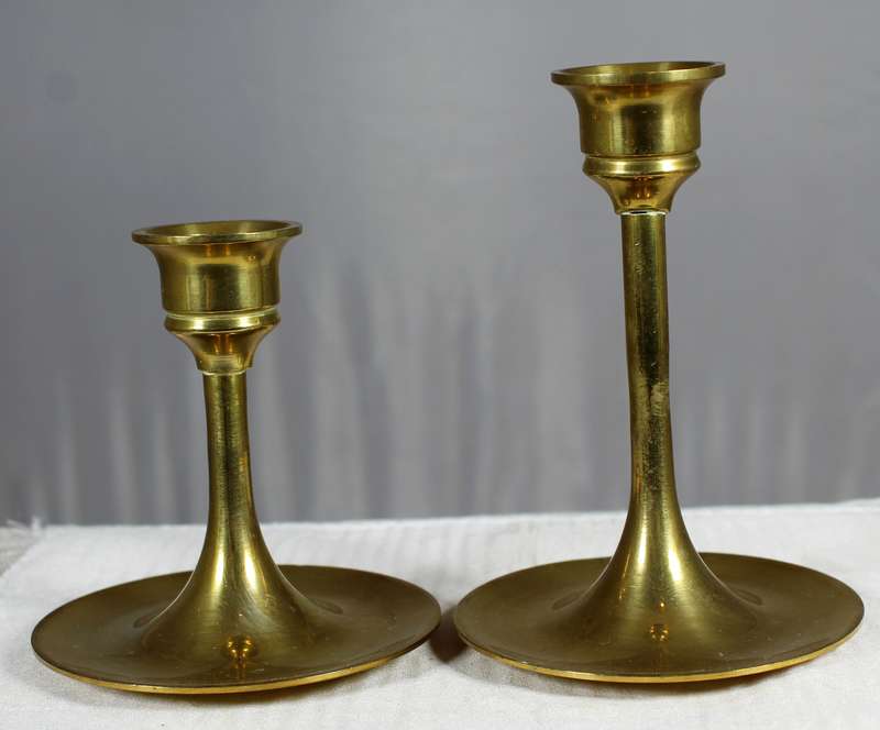 Vintage solid brass mid century graduated pair of candlestick holders with trumpet stems