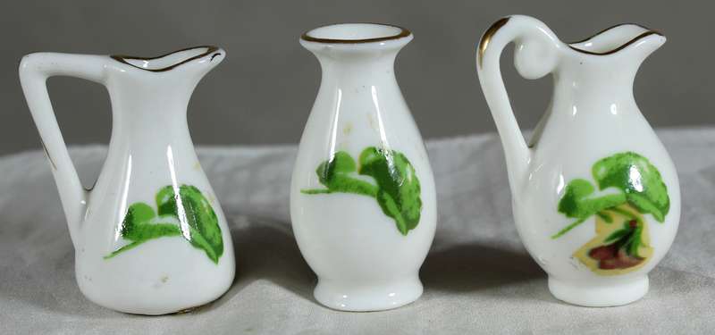 Miniature trio of jugs and posy vase