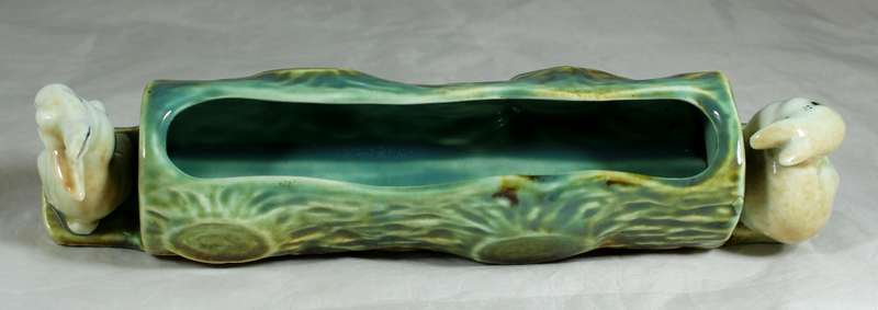 Vermont log vase with rabbits
