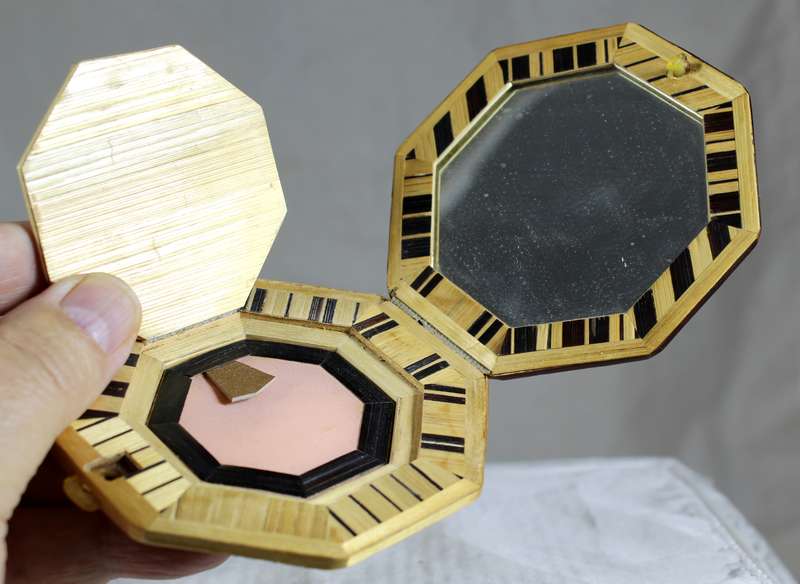 Wooden shell powder compact