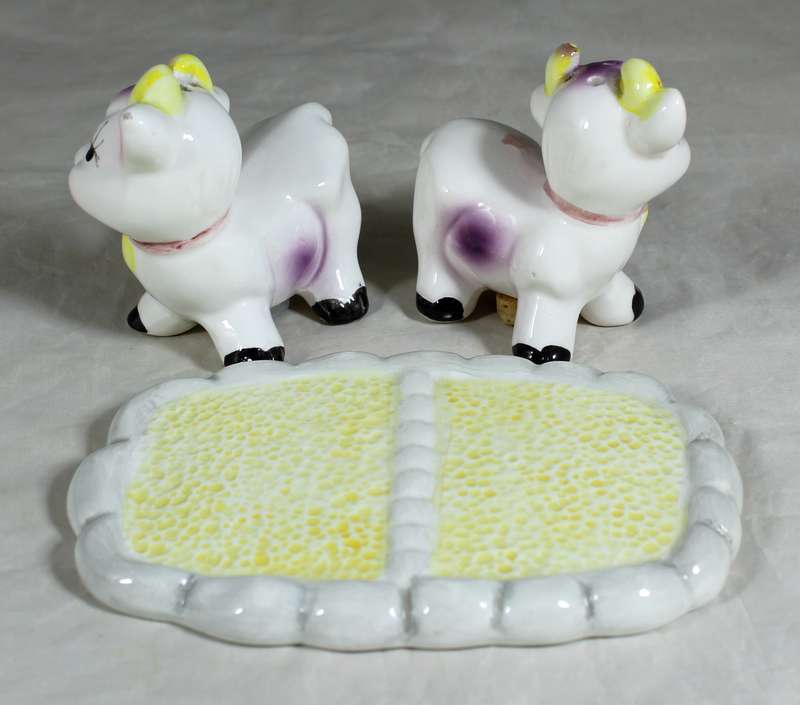Cow salt & pepper set on a base
