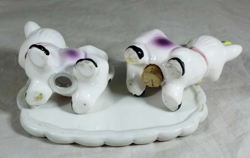 Cow salt & pepper set on a base