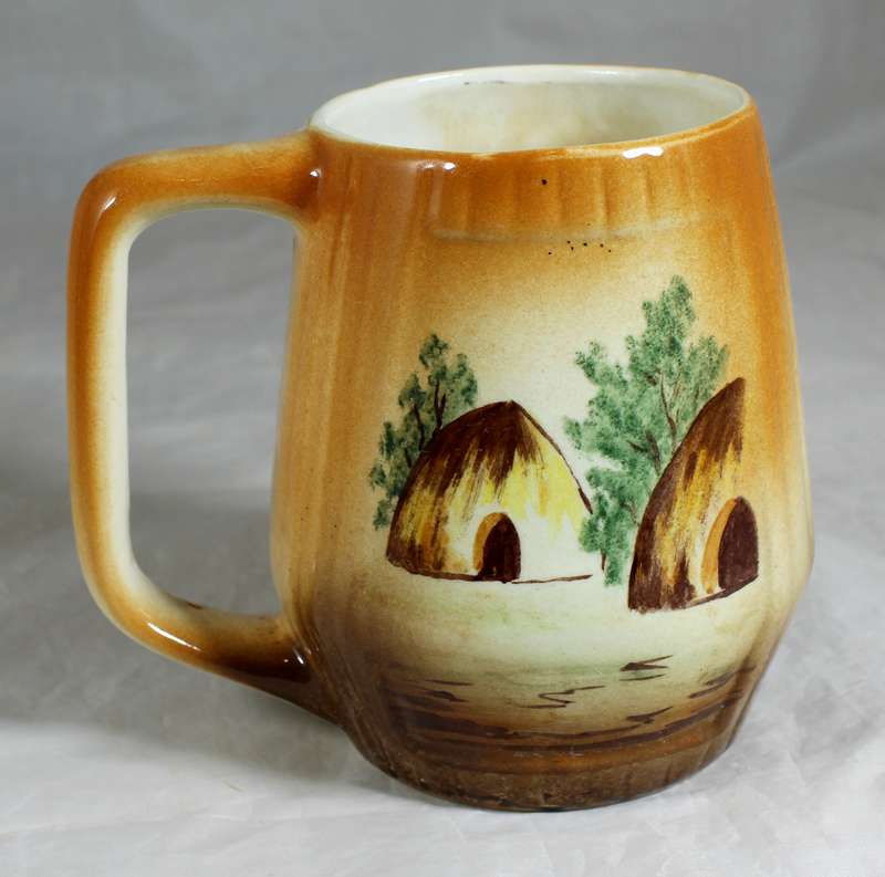 B.E.P hand painted mug with warrior & huts