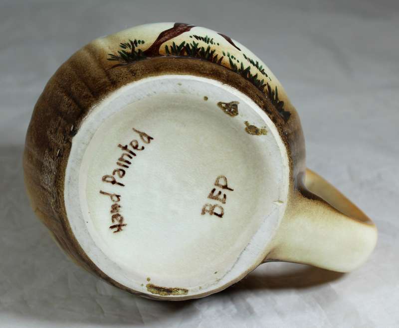 B.E.P hand painted mug with warrior & huts