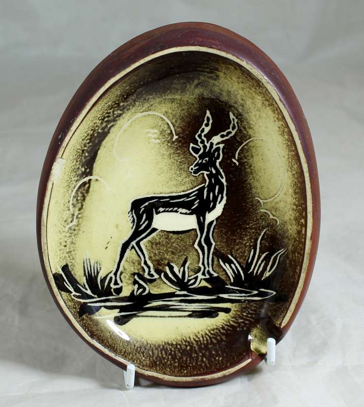 Crescent Ware - ashtray with buck