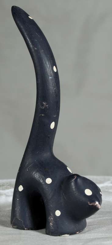 Ceramic cat with very long tail