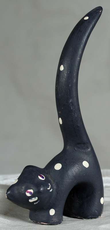 Ceramic cat with very long tail
