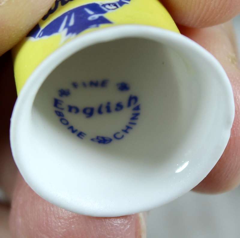 Advertising thimble - Blue ribbon wells
