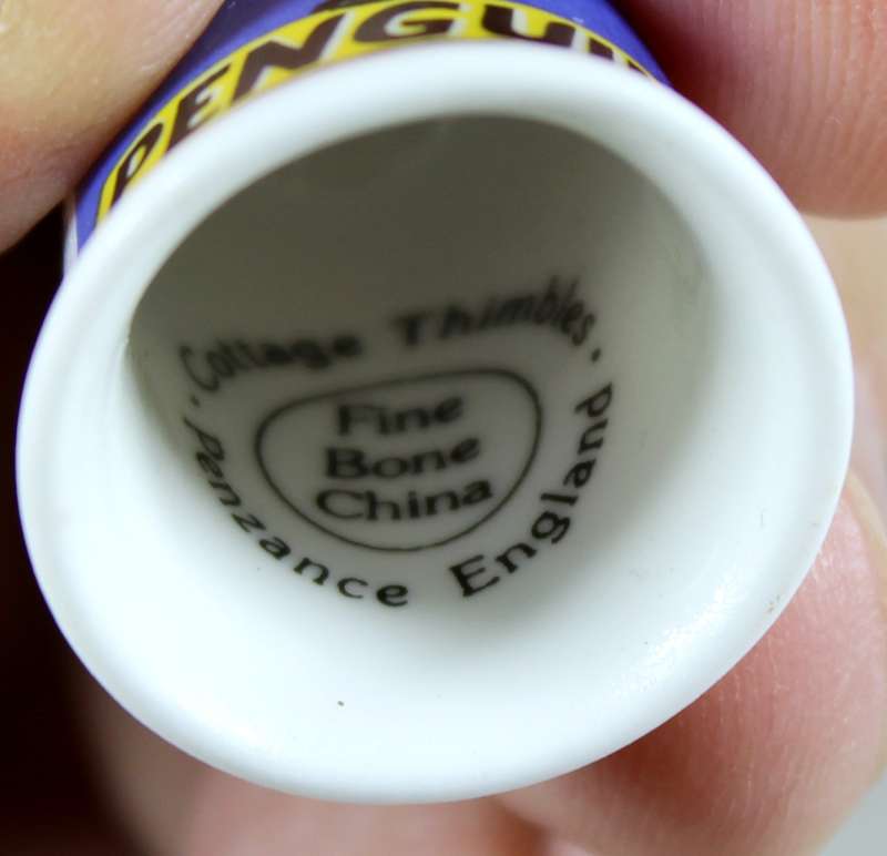 Advertising thimble - McVitie's penguin - Cottage thimbles