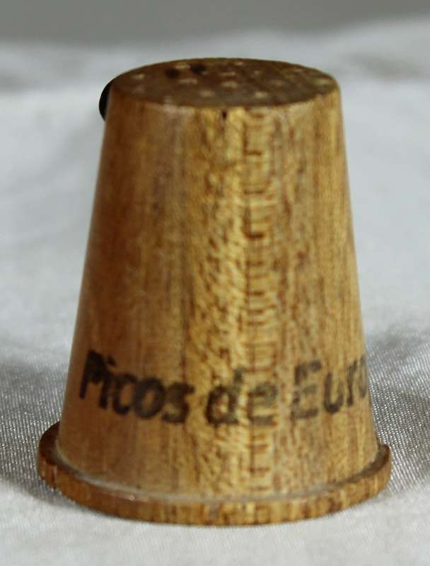 Wood thimble with witches figurine
