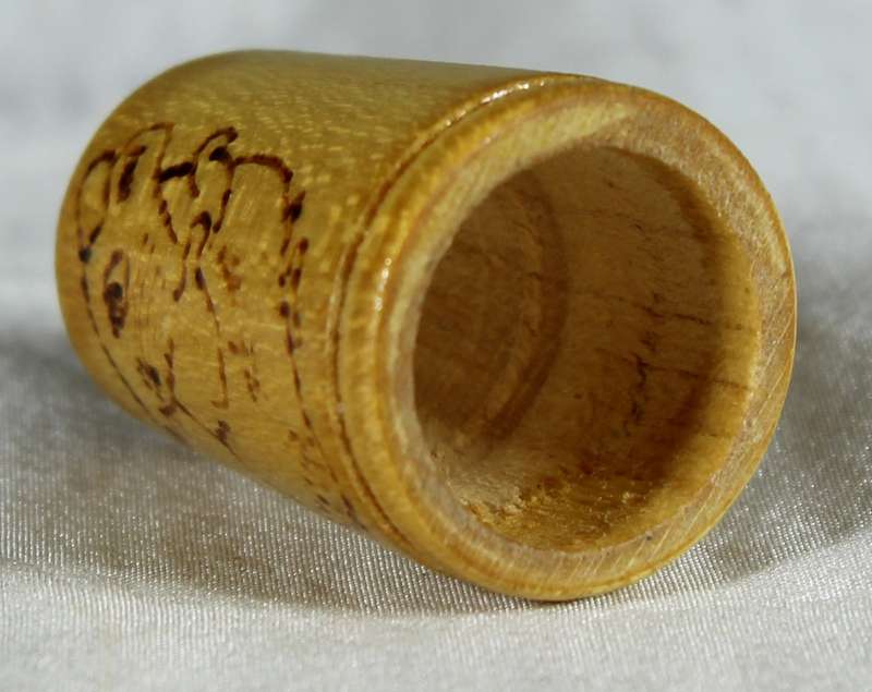 Wood thimble with mouse drawing