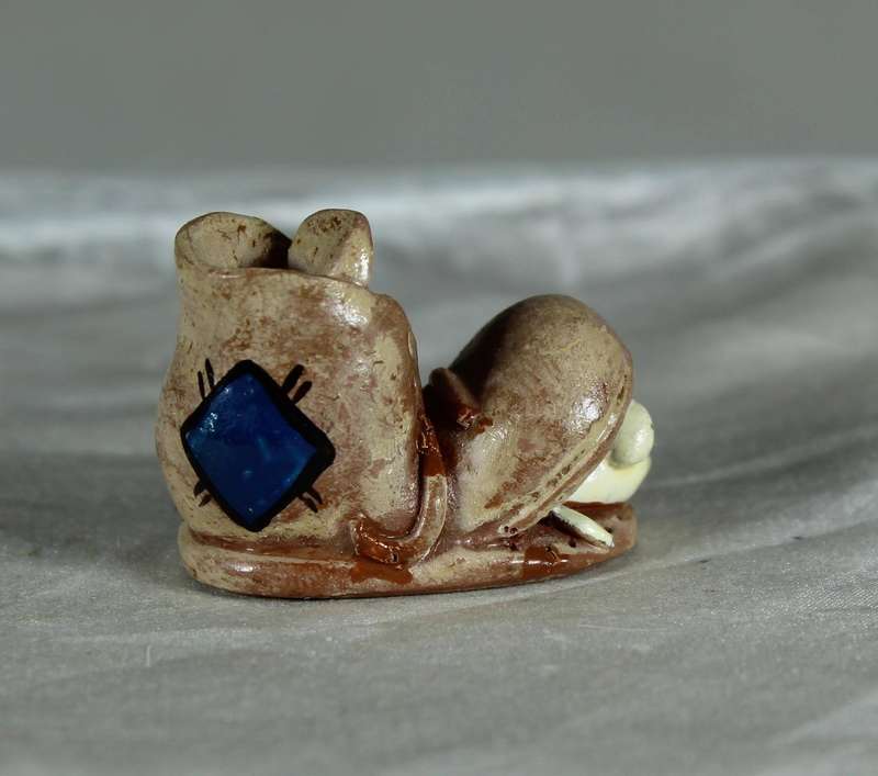 Miniature mouse in a shoe