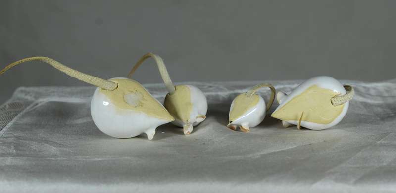Miniature family of mice with leather tails