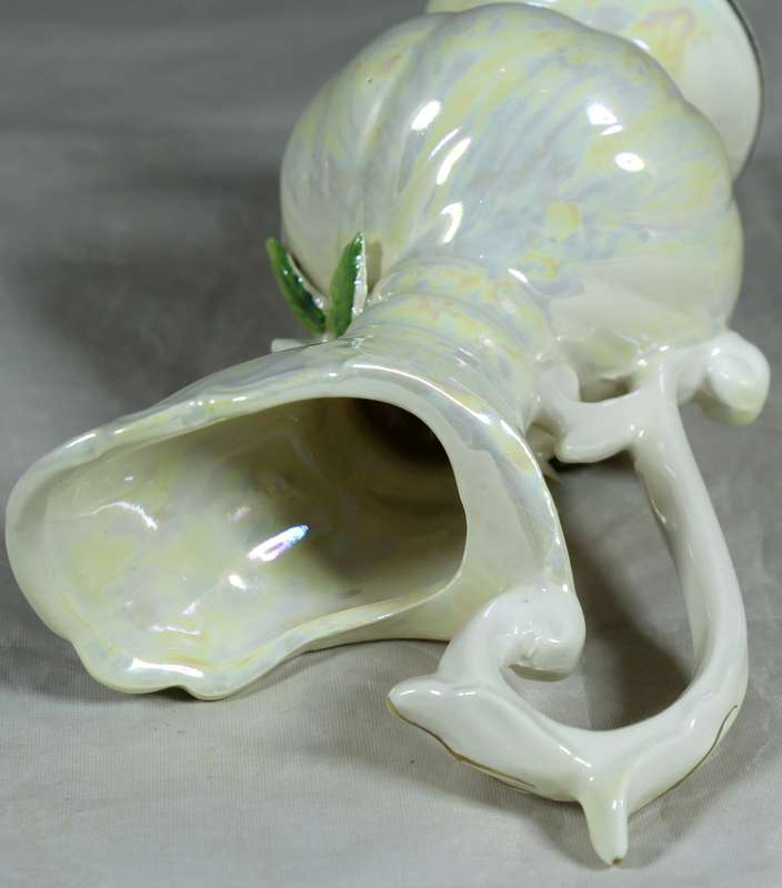 Ornate porcelain jug with flowers