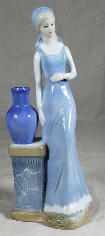 Porcelain tall lady figurine