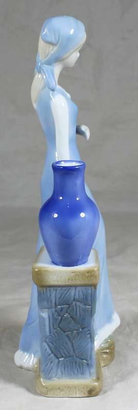 Porcelain tall lady figurine