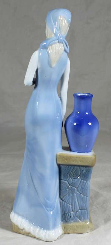 Porcelain tall lady figurine