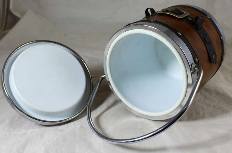 Metal cowboy with leather feel covered ice bucket