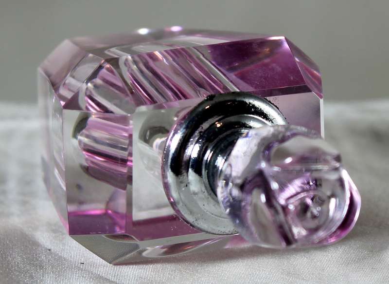 Mini pink glass perfume bottle