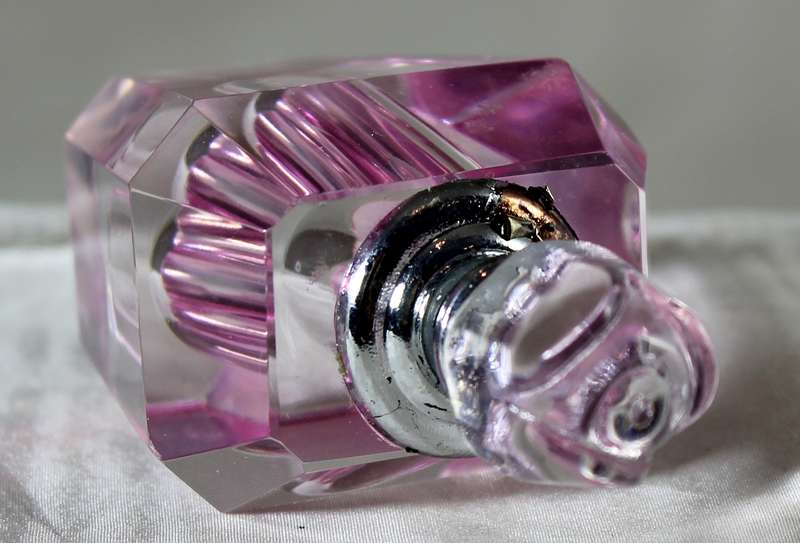 Mini pink glass perfume bottle